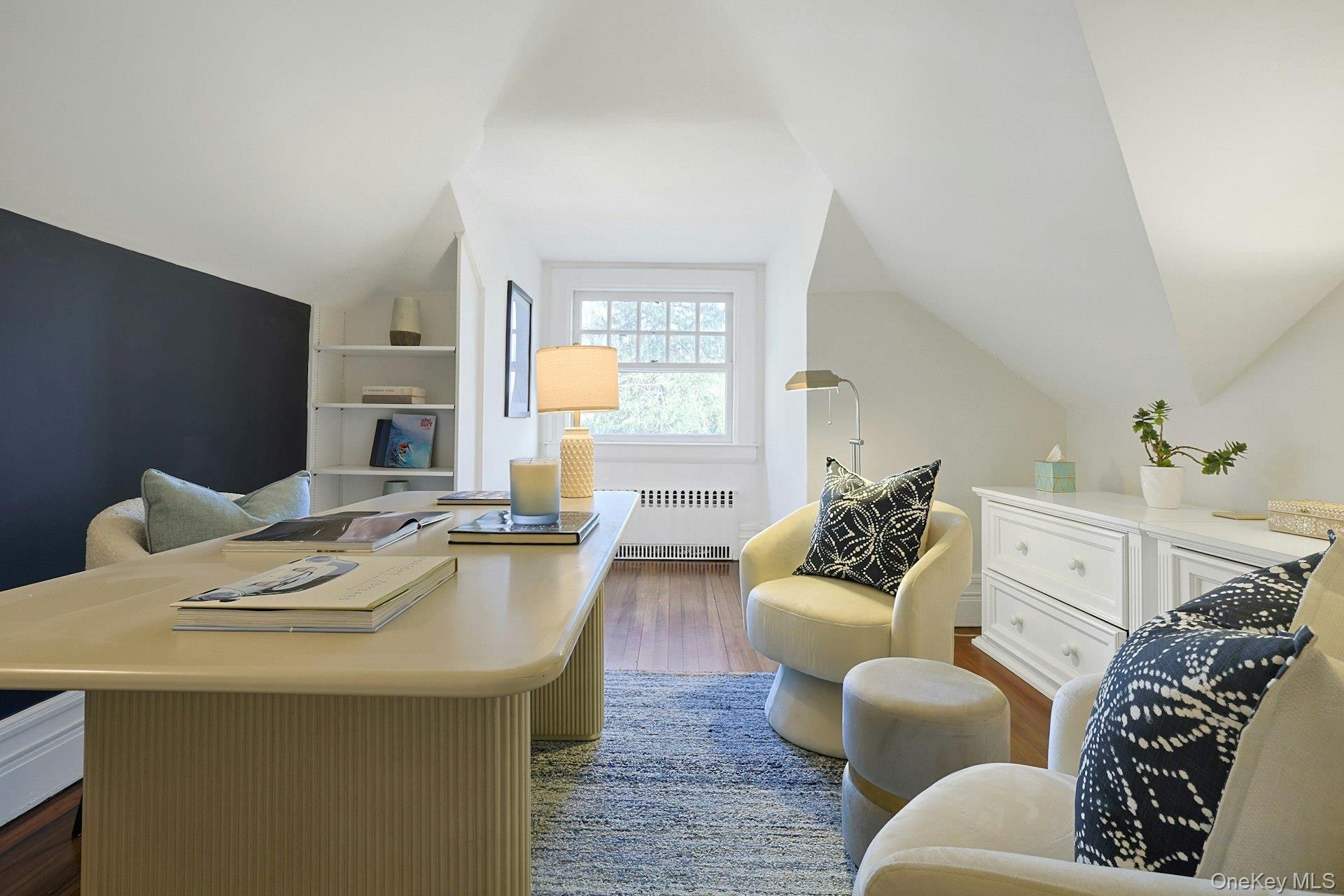 34 Park Road Scarsdale, NY 10583 - Photo 30 of 49 a living room with furniture and a fireplace