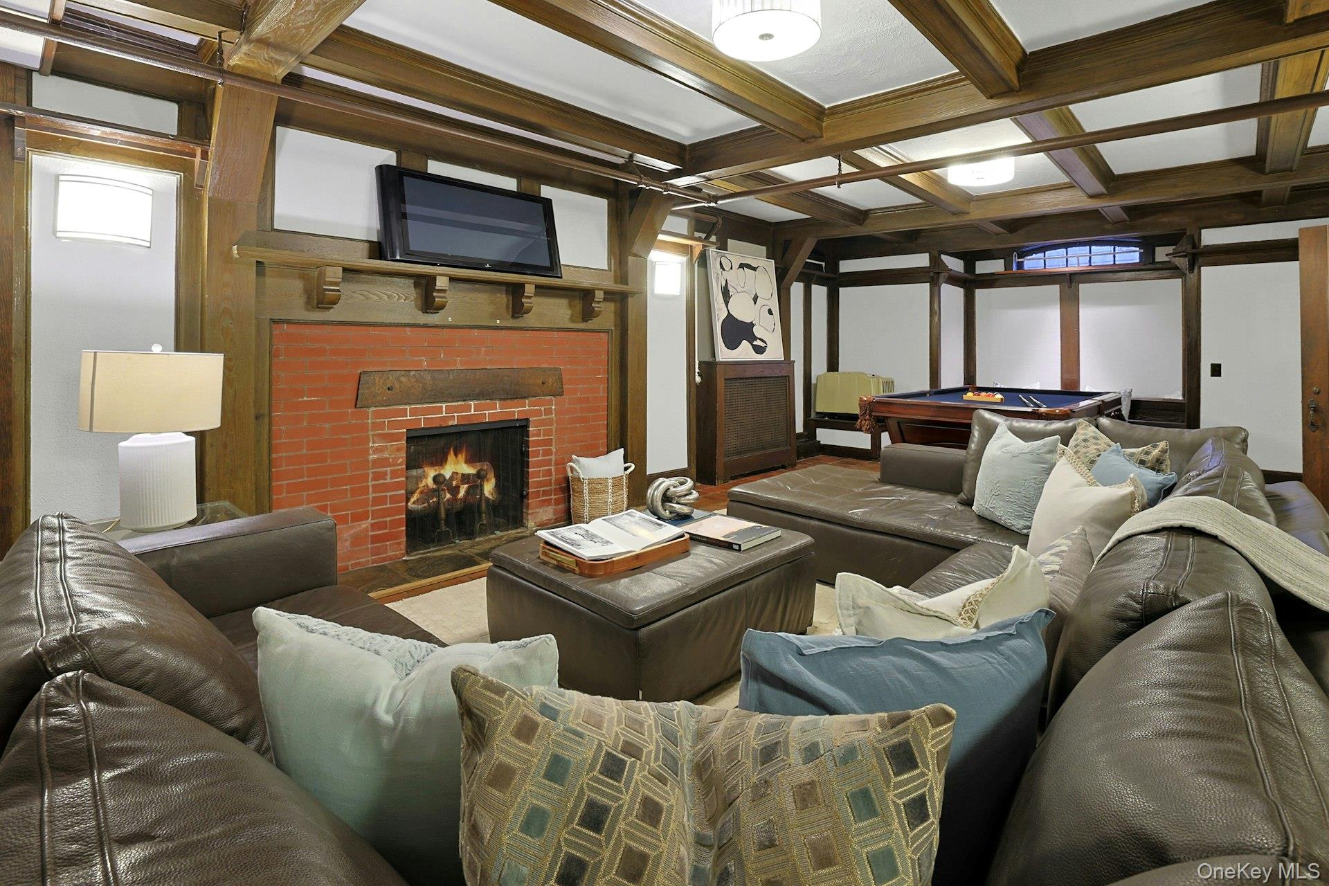 34 Park Road Scarsdale, NY 10583 - Photo 33 of 49 a living room with furniture and a fireplace