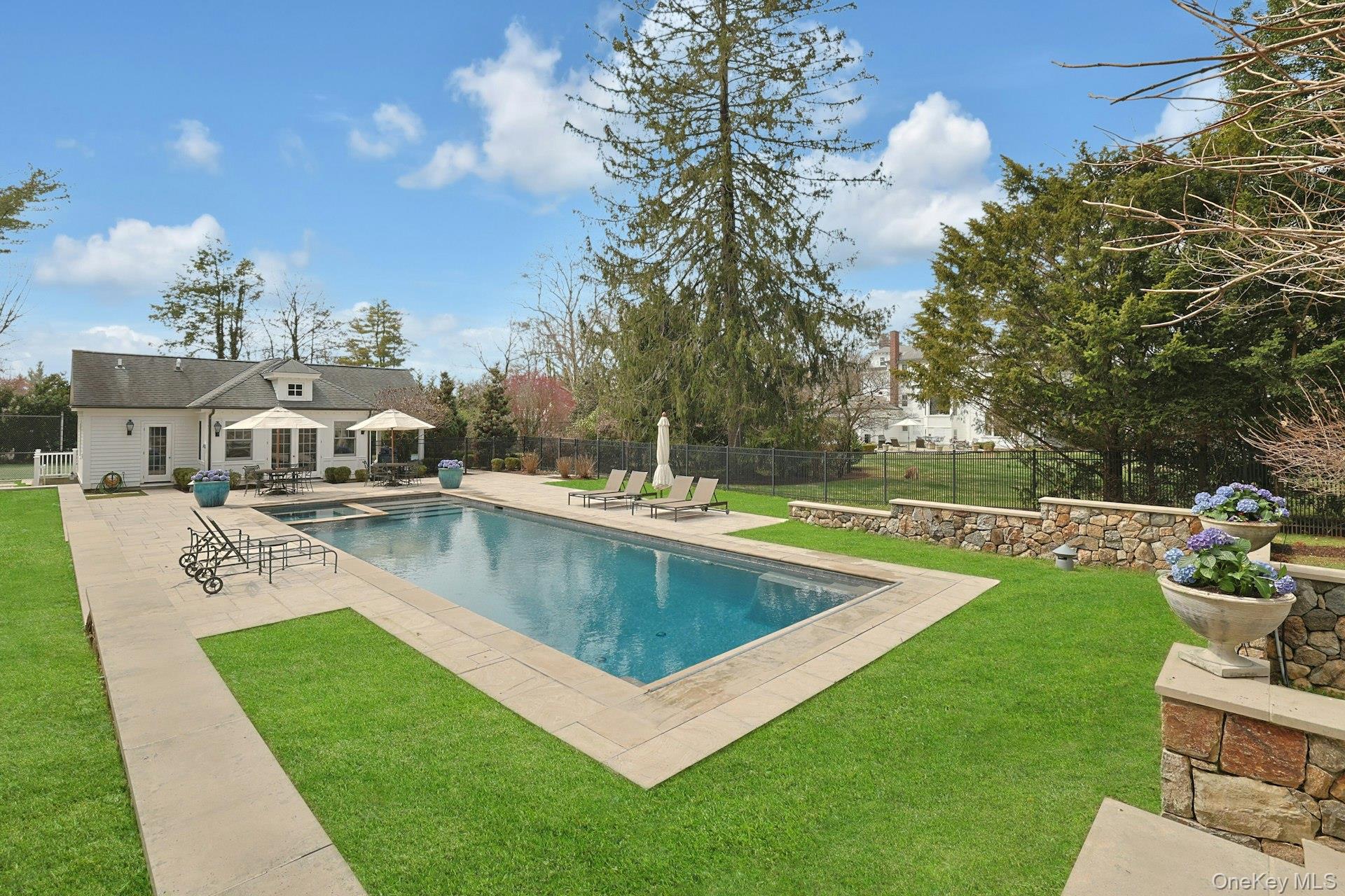 34 Park Road Scarsdale, NY 10583 - Photo 45 of 49 a view of a house with swimming pool