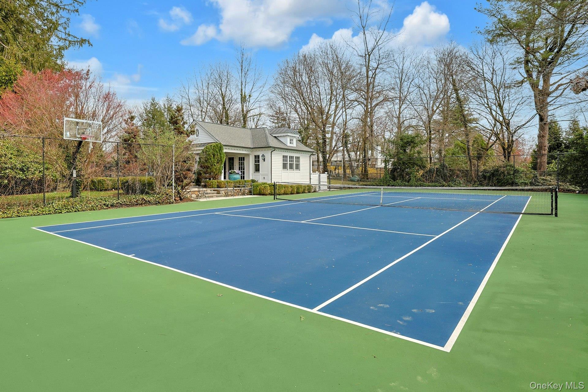 34 Park Road Scarsdale, NY 10583 - Photo 46 of 49 a view of an outdoor space and tennis court