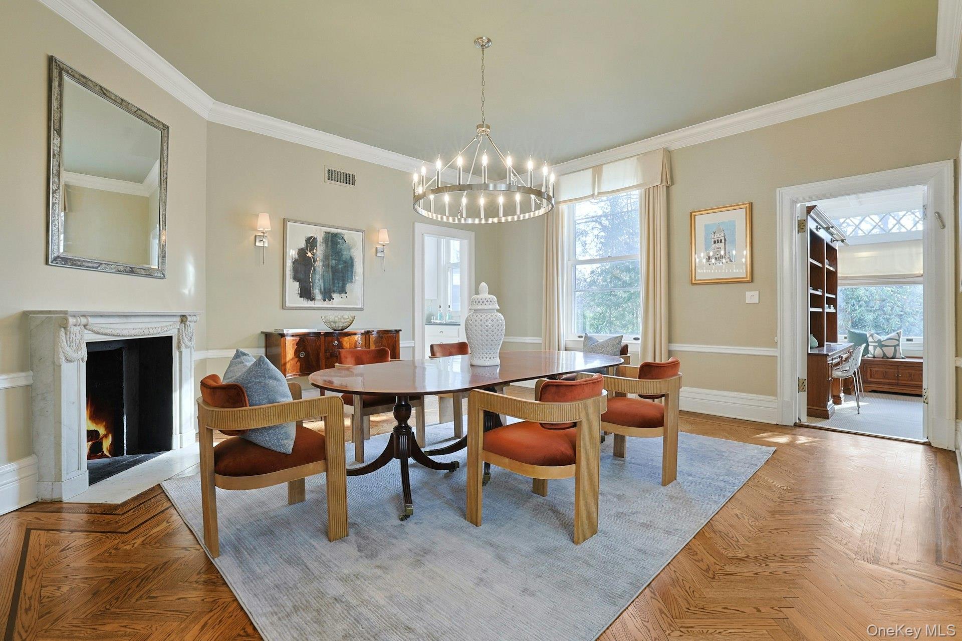 34 Park Road Scarsdale, NY 10583 - Photo 8 of 49 a living room with furniture a chandelier and a fireplace