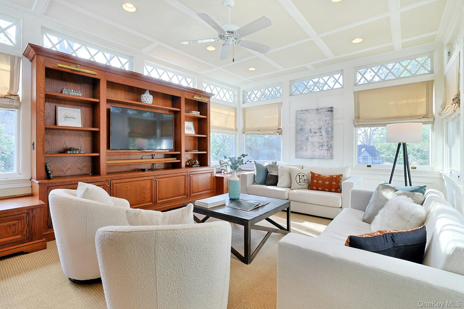 34 Park Road Scarsdale, NY 10583 - Photo 10 of 49 a living room with furniture and a flat screen tv
