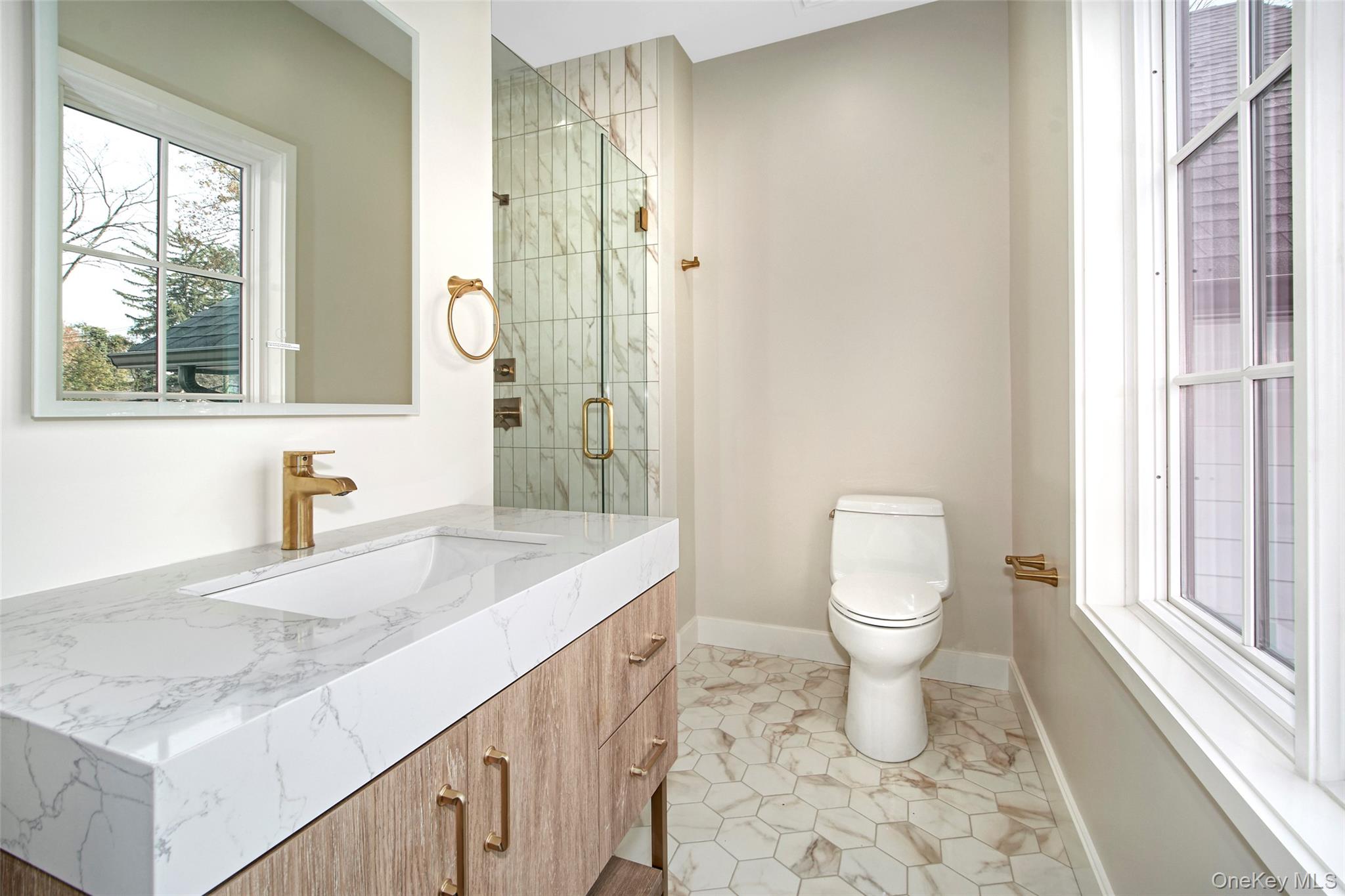 2 Myrtledale Road Scarsdale, NY 10583 - Photo 20 of 33 a bathroom with a sink a toilet and a bathtub