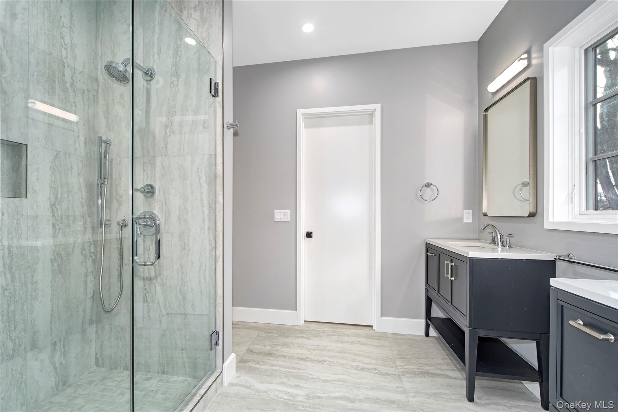 2 Myrtledale Road Scarsdale, NY 10583 - Photo 23 of 33 a bathroom with a shower and a sink