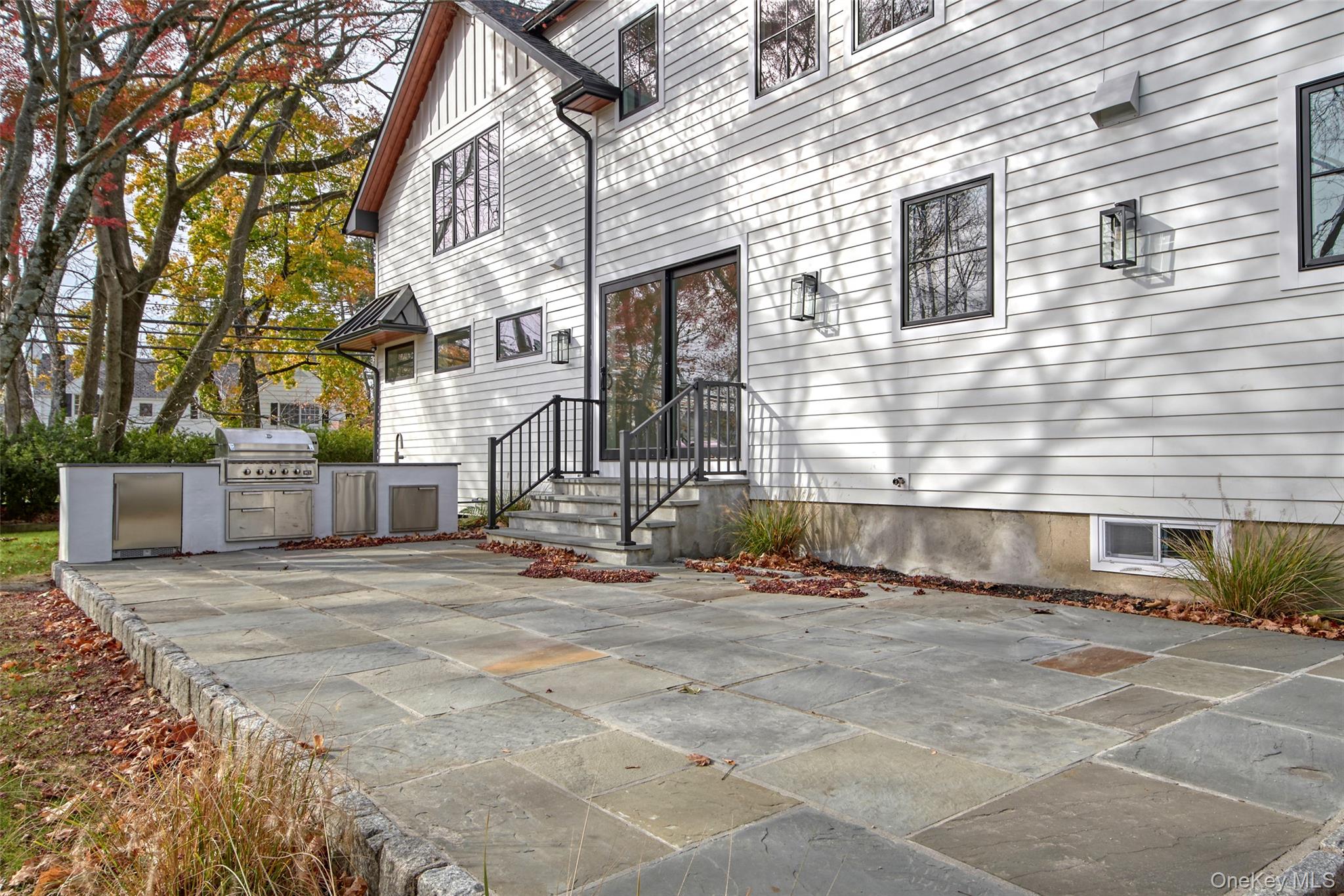 2 Myrtledale Road Scarsdale, NY 10583 - Photo 26 of 33 a view of a house with a patio
