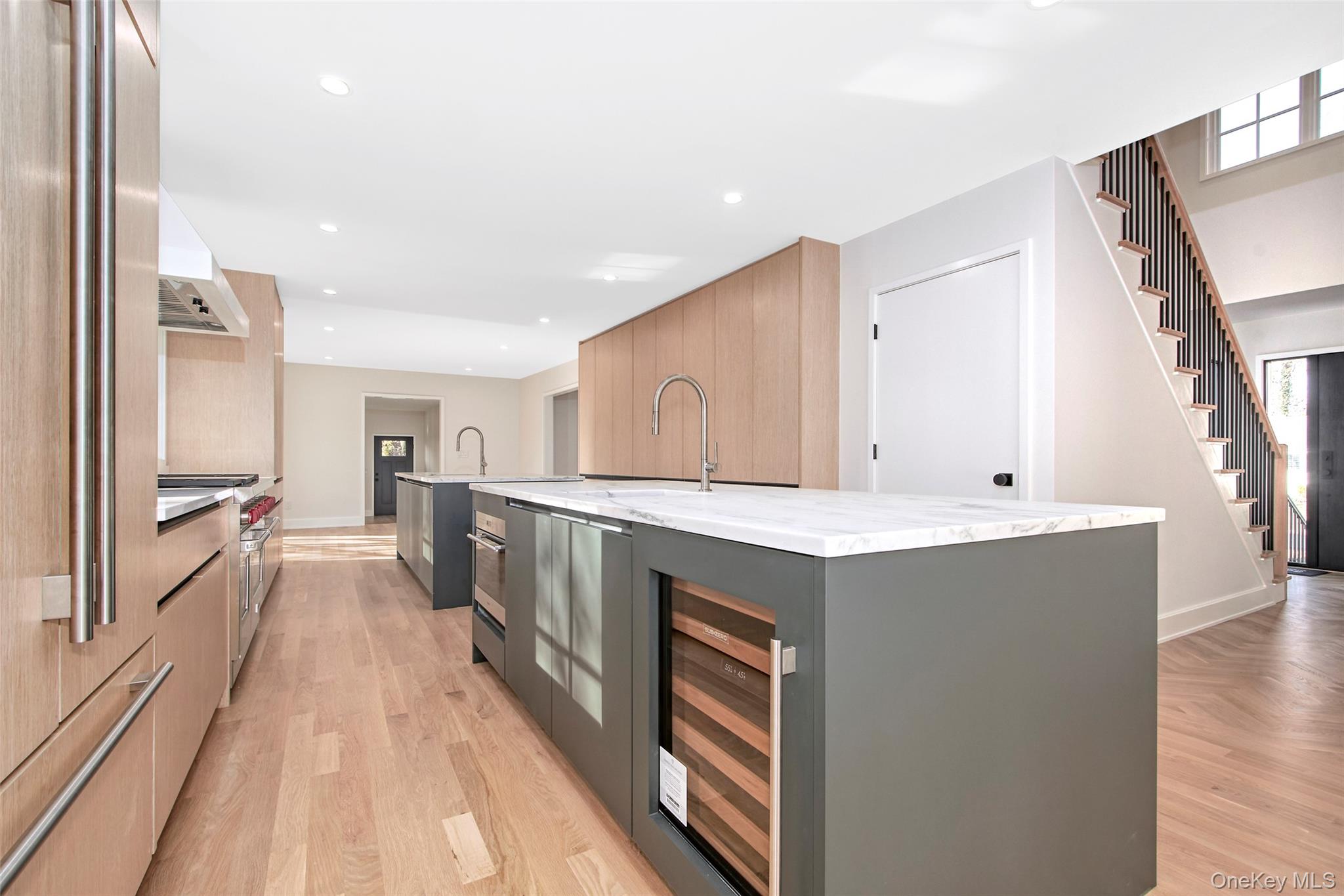2 Myrtledale Road Scarsdale, NY 10583 - Photo 3 of 33 a kitchen with a sink stove and wooden floor