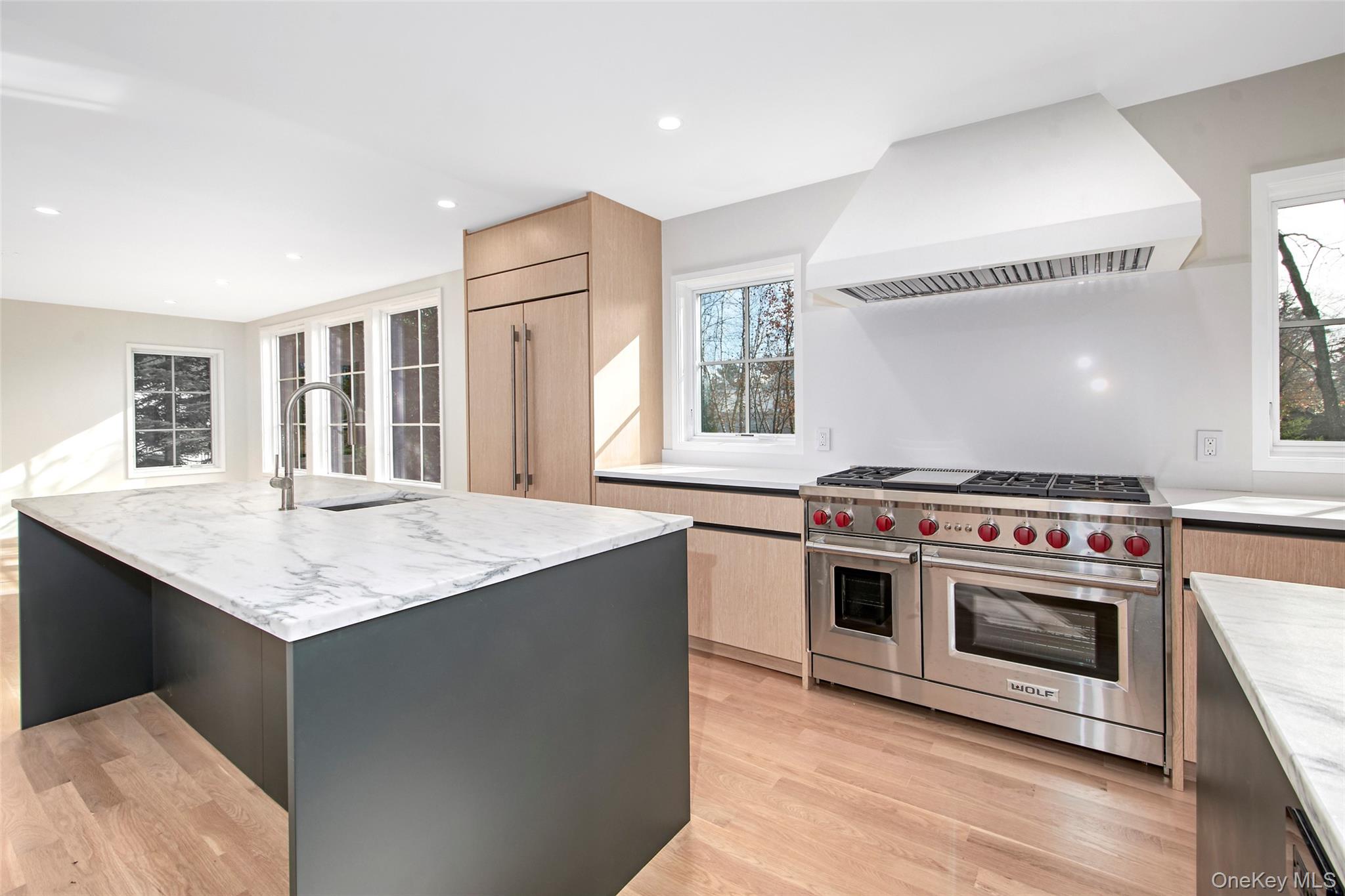2 Myrtledale Road Scarsdale, NY 10583 - Photo 4 of 33 a kitchen with a stove and a sink