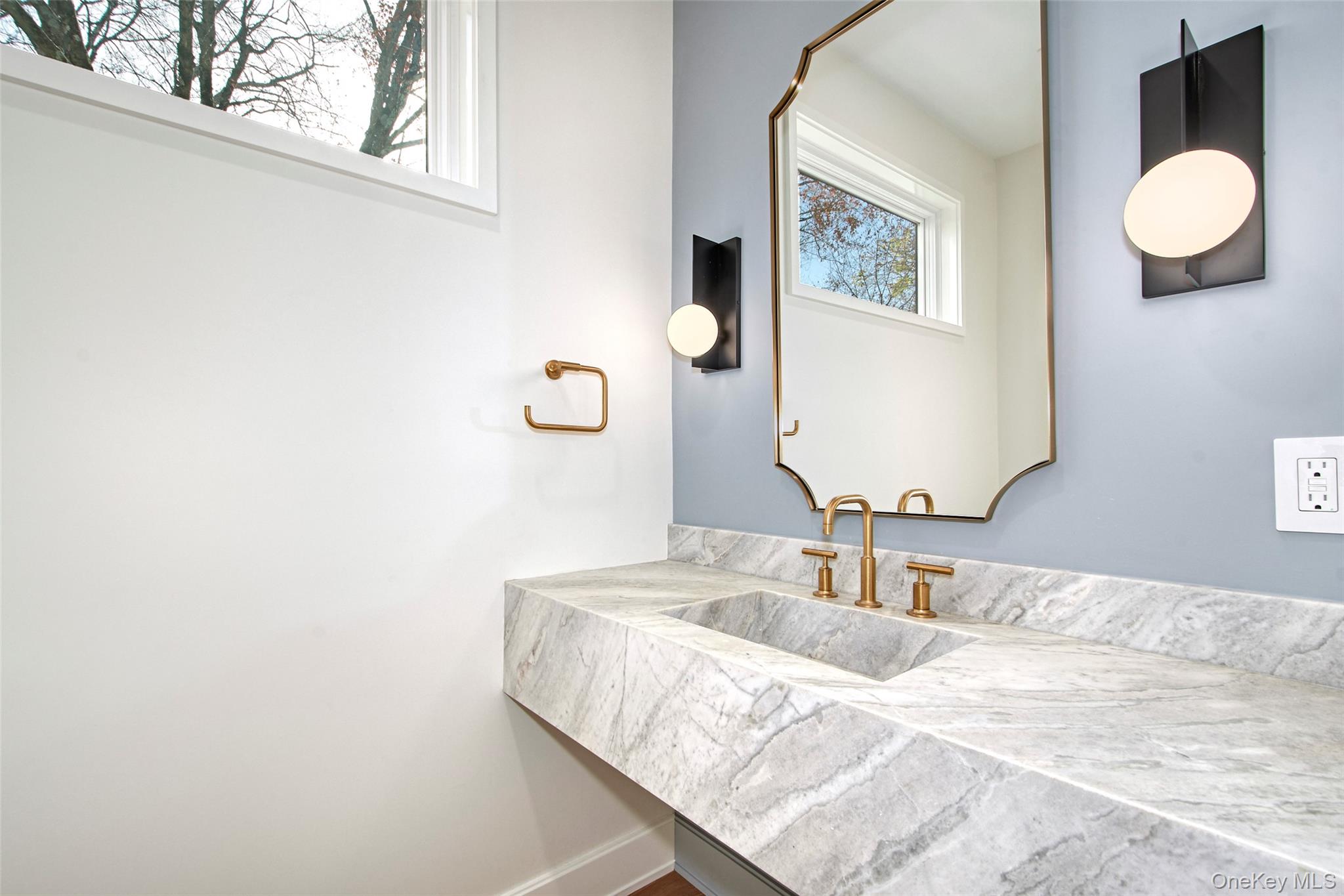 2 Myrtledale Road Scarsdale, NY 10583 - Photo 9 of 33 a bathroom with a granite countertop sink and a mirror