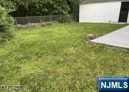 743 Newcomb Road Ridgewood, NJ 07450 - Photo 17 of 19 a view of a backyard