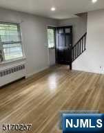743 Newcomb Road Ridgewood, NJ 07450 - Photo 5 of 19 a view of an empty room with stairs