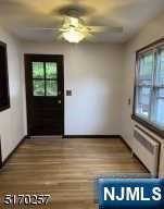 743 Newcomb Road Ridgewood, NJ 07450 - Photo 7 of 19 a view of a livingroom with an entryway