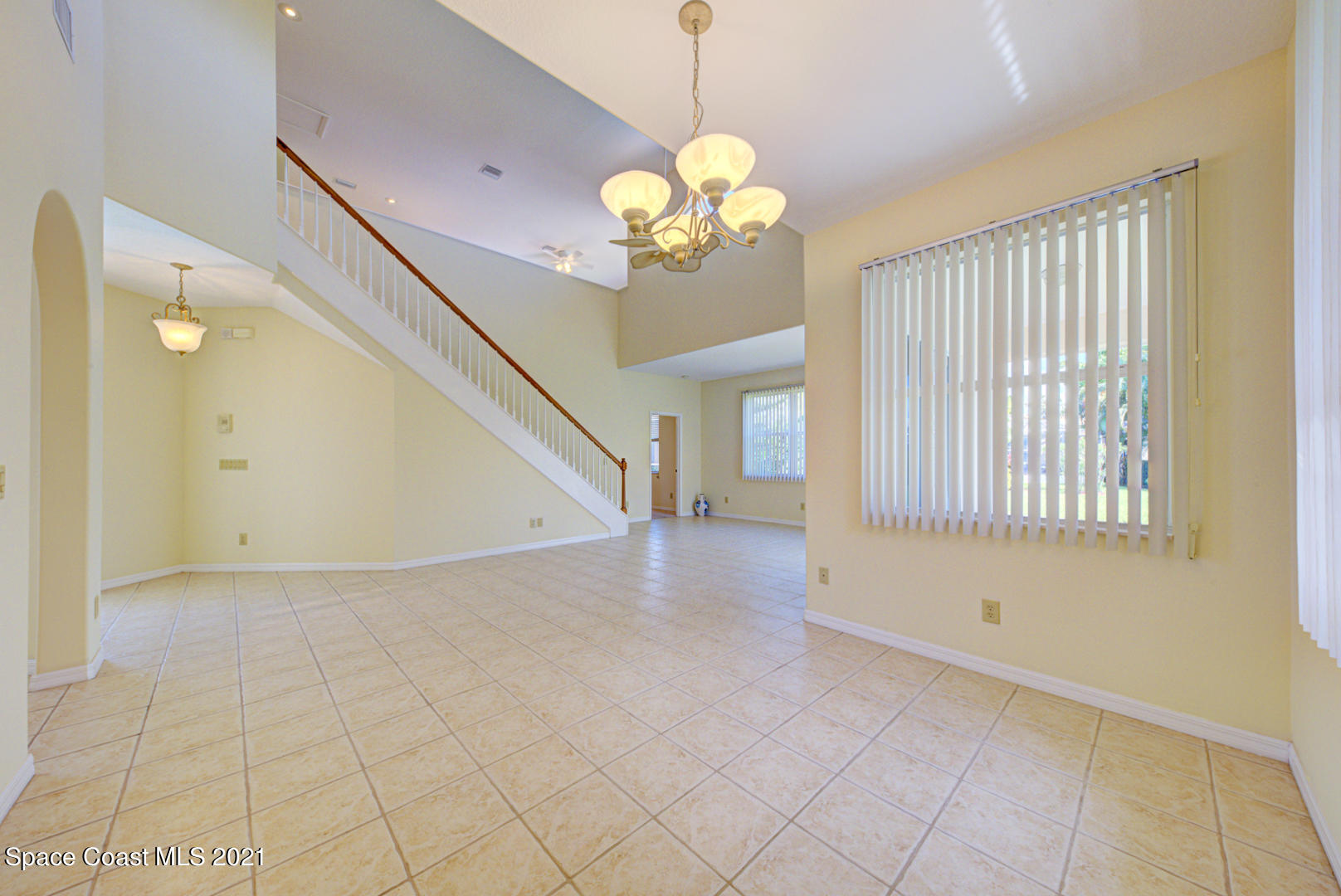 8206 Simpkins Way Melbourne, FL 32940 - Photo 29 of 66 dining room open to living room (1) - Co