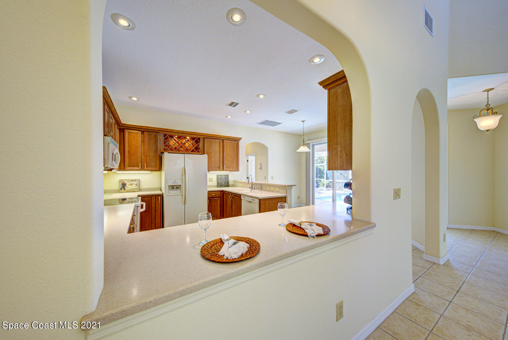 8206 Simpkins Way Melbourne, FL 32940 - Photo 30 of 66 dining room pass-thru (1) - Copy