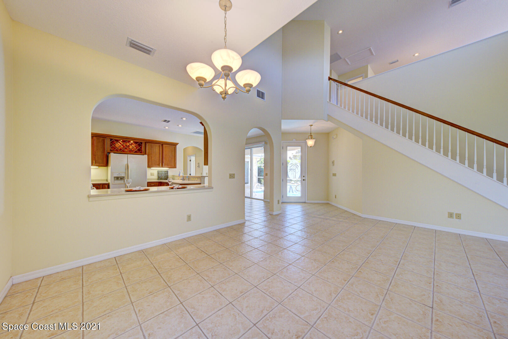 8206 Simpkins Way Melbourne, FL 32940 - Photo 32 of 66 dining room with pass-thru to kitchen (1