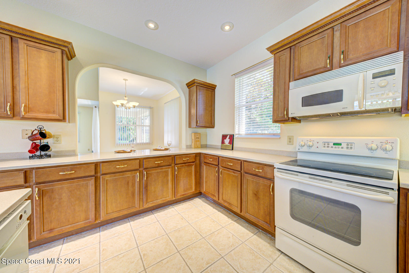 8206 Simpkins Way Melbourne, FL 32940 - Photo 38 of 66 kitchen with recessed lights