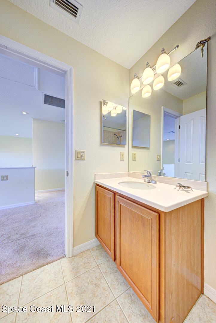 8206 Simpkins Way Melbourne, FL 32940 - Photo 43 of 66 loft bathroom vanity - Copy