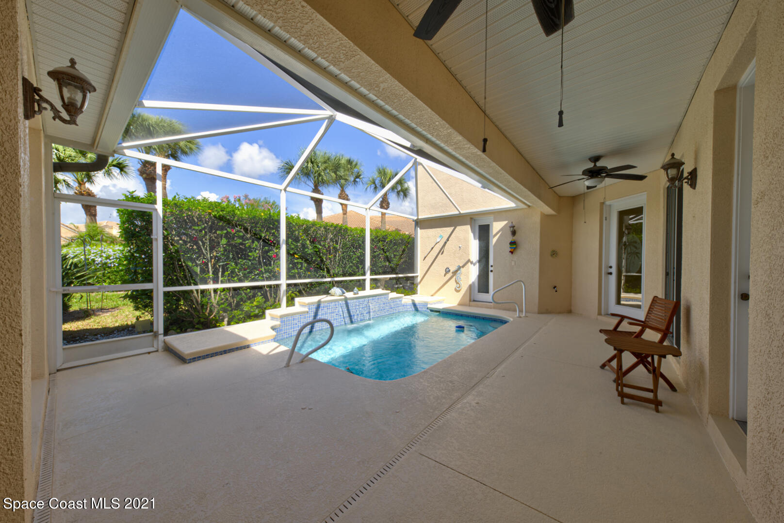 8206 Simpkins Way Melbourne, FL 32940 - Photo 46 of 66 courtyard with pool (1) - Copy