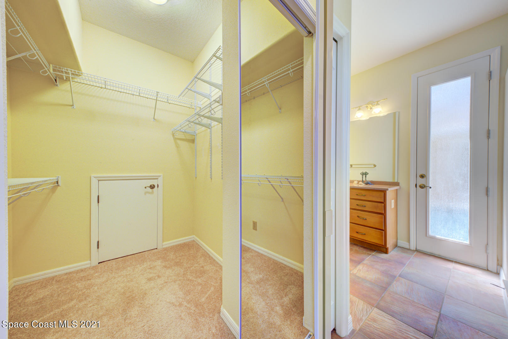 8206 Simpkins Way Melbourne, FL 32940 - Photo 50 of 66 master walk-in closet #1 - Copy