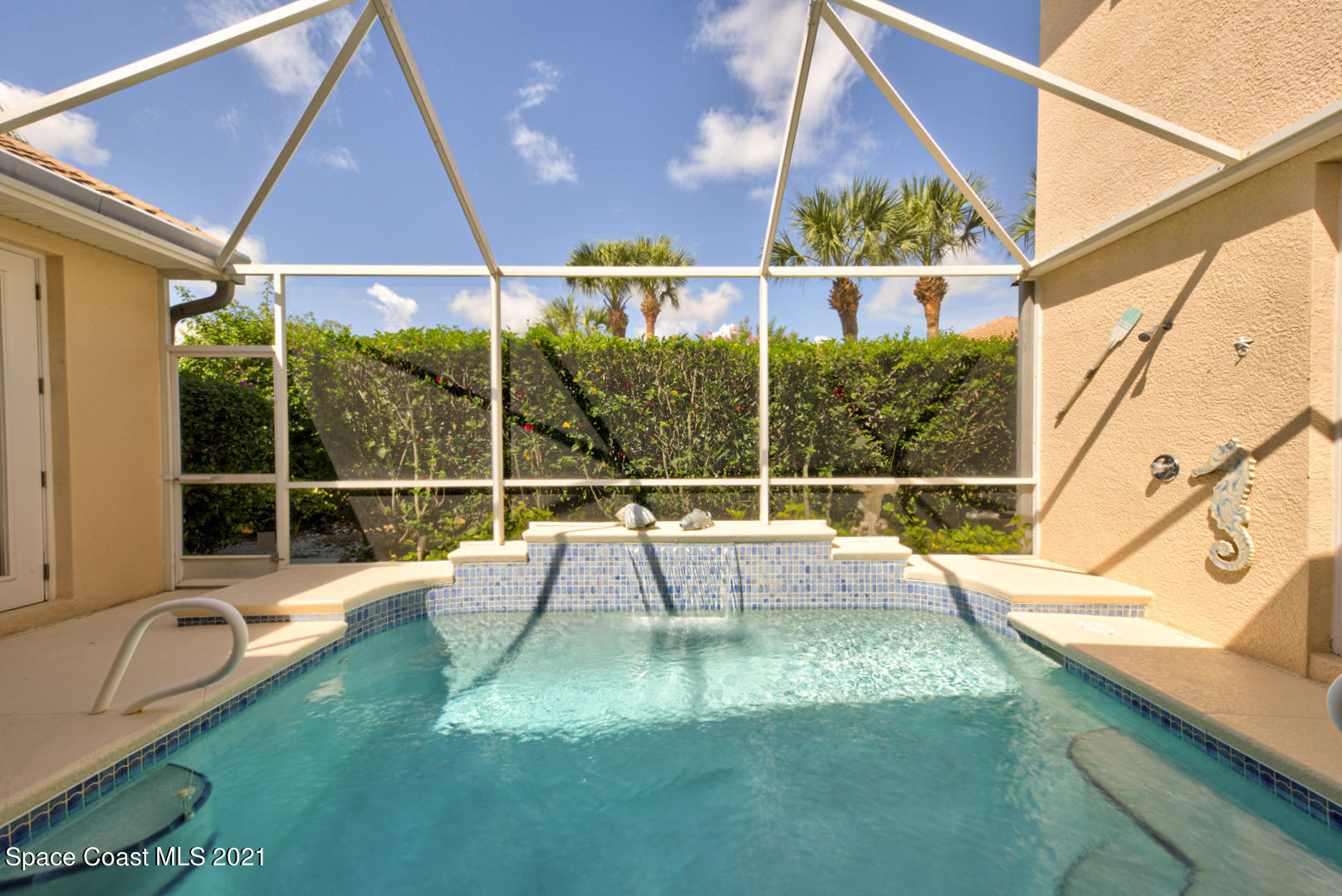 8206 Simpkins Way Melbourne, FL 32940 - Photo 55 of 66 pool with waterfall (1) - Copy