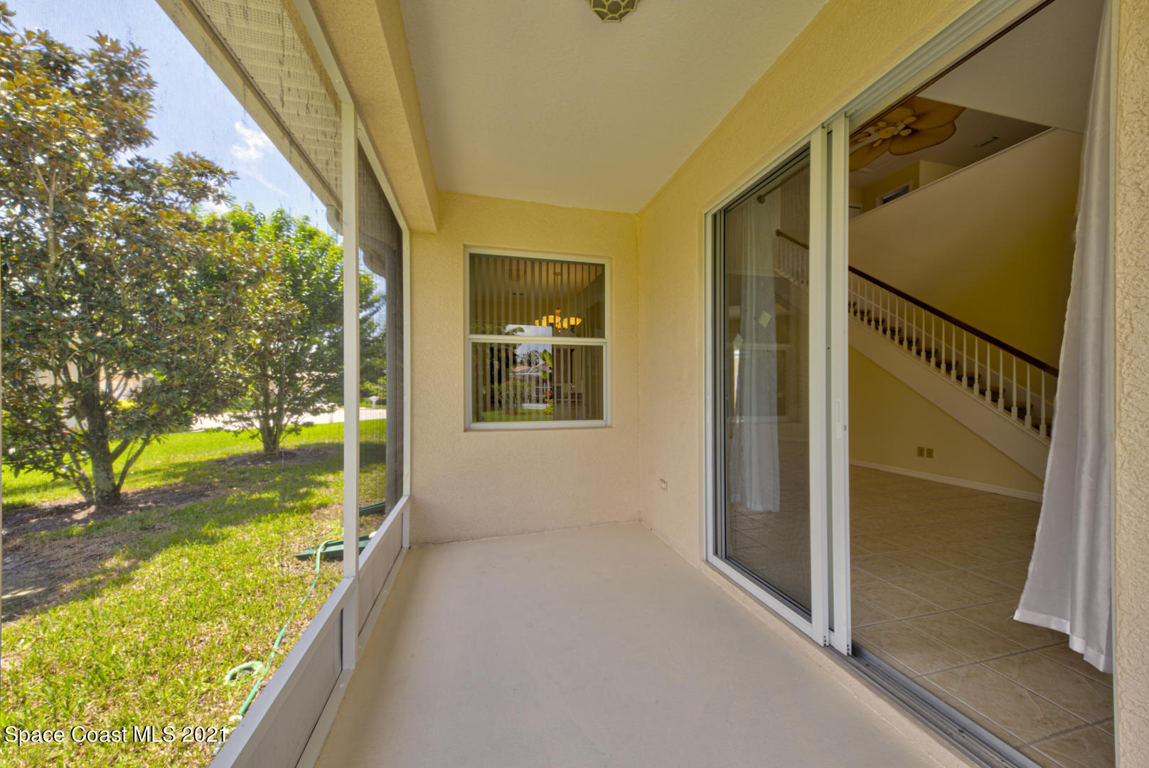8206 Simpkins Way Melbourne, FL 32940 - Photo 57 of 66 screened in porch (1) - Copy