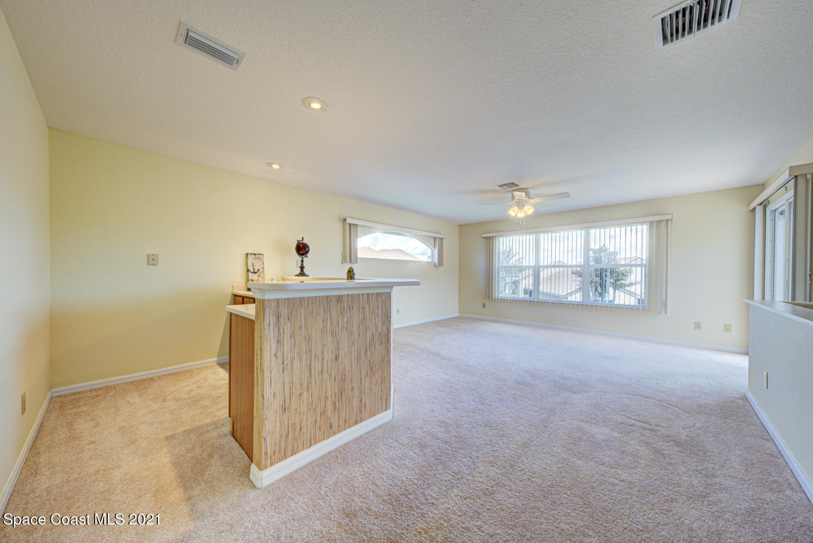 8206 Simpkins Way Melbourne, FL 32940 - Photo 64 of 66 second floor loft with wet bar (1)