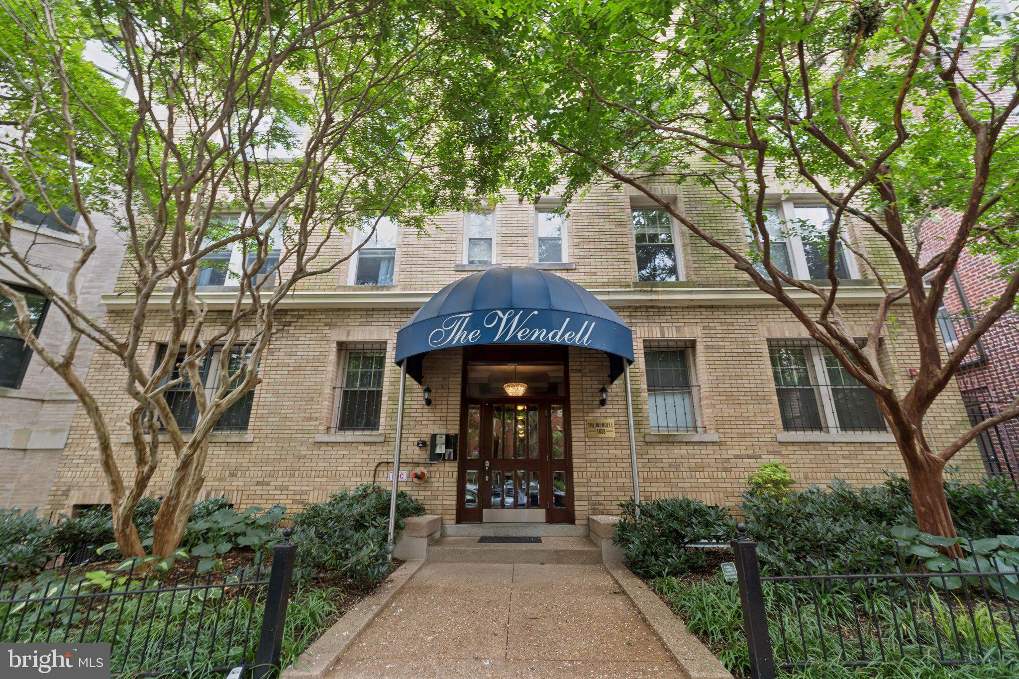 1858 California Street Northwest, Unit 5 Washington, DC 20009 - Photo 2 of 23 a front view of a house with garden