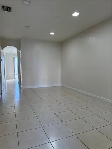a view of a livingroom with wooden floor