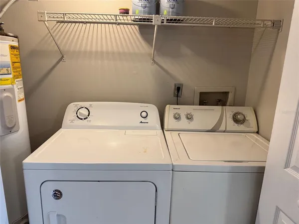 a utility room with dryer and washer