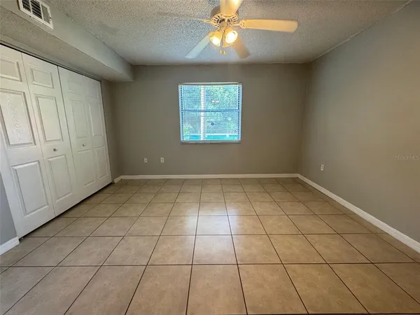 en empty room with windows