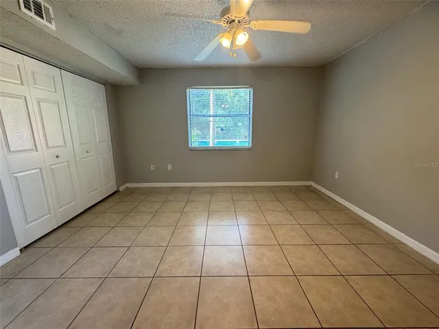 en empty room with windows