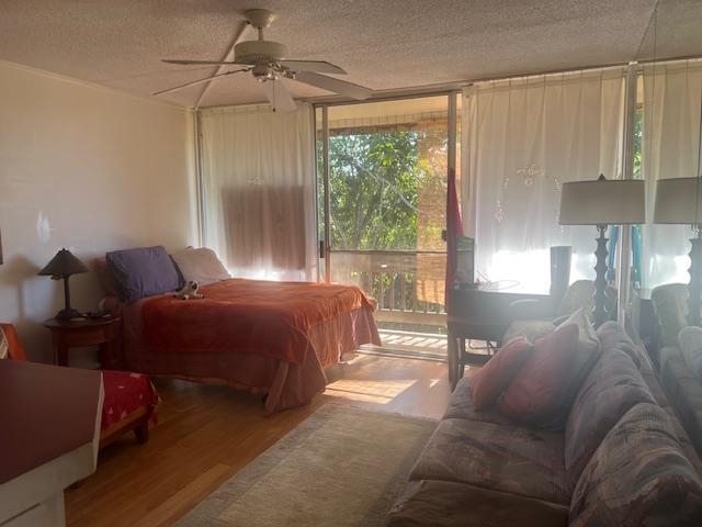 120 Hui Rd F, Unit I16 Lahaina, HI 96761 - Photo 11 of 28 a bedroom with a bed lamps and window