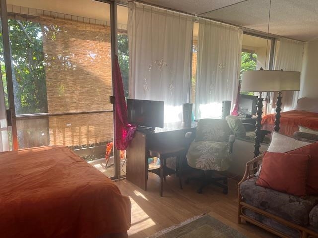 120 Hui Rd F, Unit I16 Lahaina, HI 96761 - Photo 13 of 28 a bed room with a bed and a window