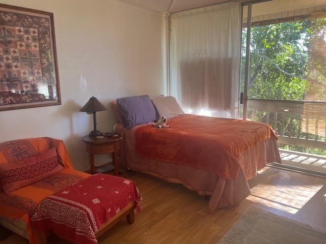 120 Hui Rd F, Unit I16 Lahaina, HI 96761 - Photo 14 of 28 a bedroom with a bed and window