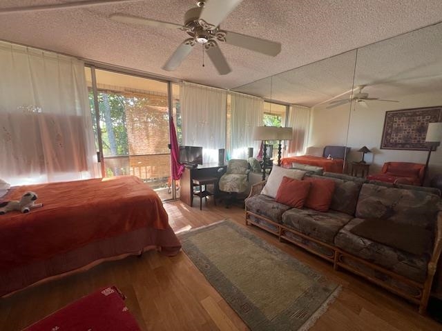 120 Hui Rd F, Unit I16 Lahaina, HI 96761 - Photo 15 of 28 a living room with furniture and a flat screen tv