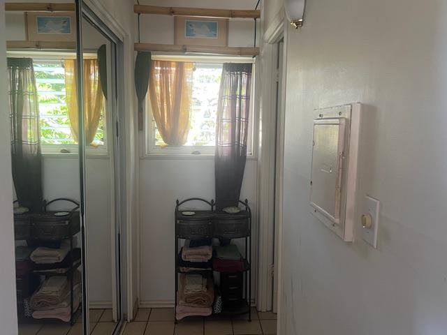 120 Hui Rd F, Unit I16 Lahaina, HI 96761 - Photo 18 of 28 a view of a hallway with closet and a window