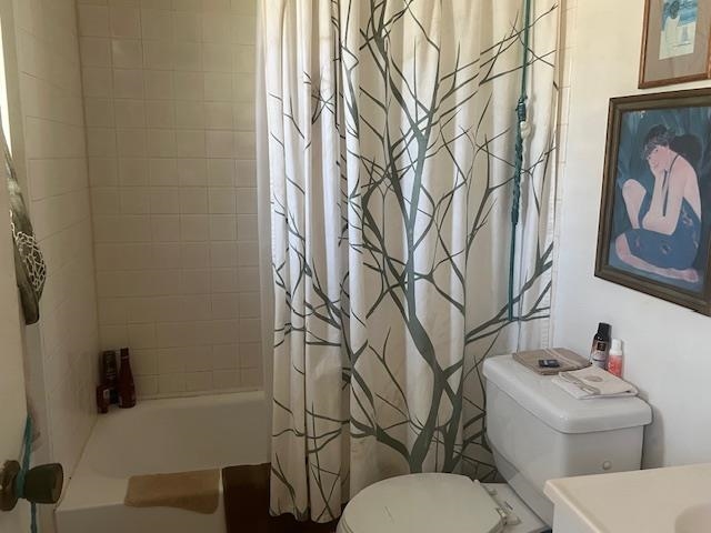 120 Hui Rd F, Unit I16 Lahaina, HI 96761 - Photo 19 of 28 a white toilet sitting next to a bathroom sink