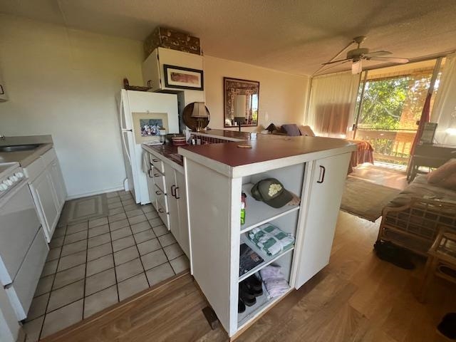 120 Hui Rd F, Unit I16 Lahaina, HI 96761 - Photo 10 of 28 a storage room with washer and dryer
