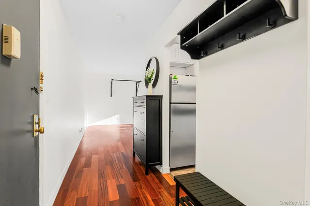 a view of balcony with wooden floor