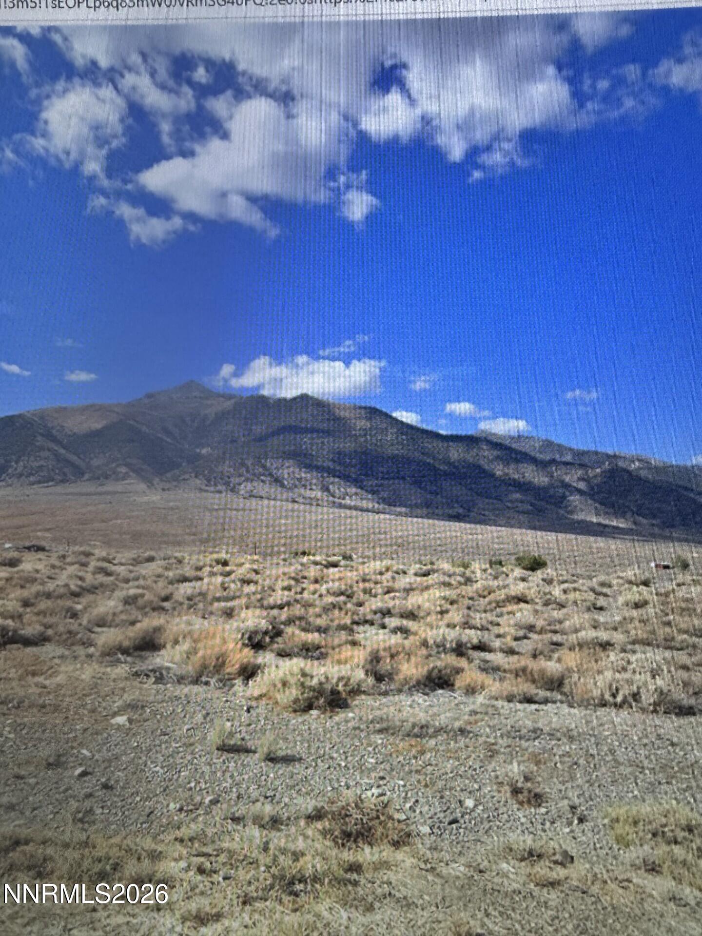 a view of ocean with sunset