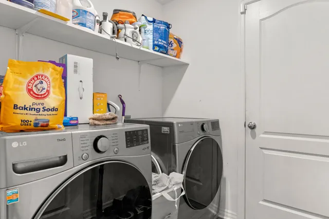a utility room with dryer and washer