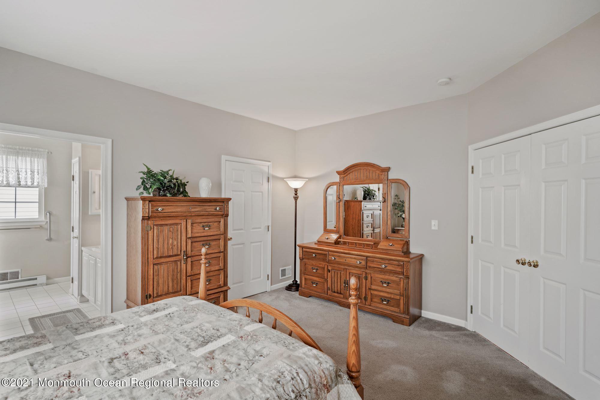 26 Shelley Road Brick, NJ 08724 - Photo 14 of 37 a bedroom with a bed and a dresser in it