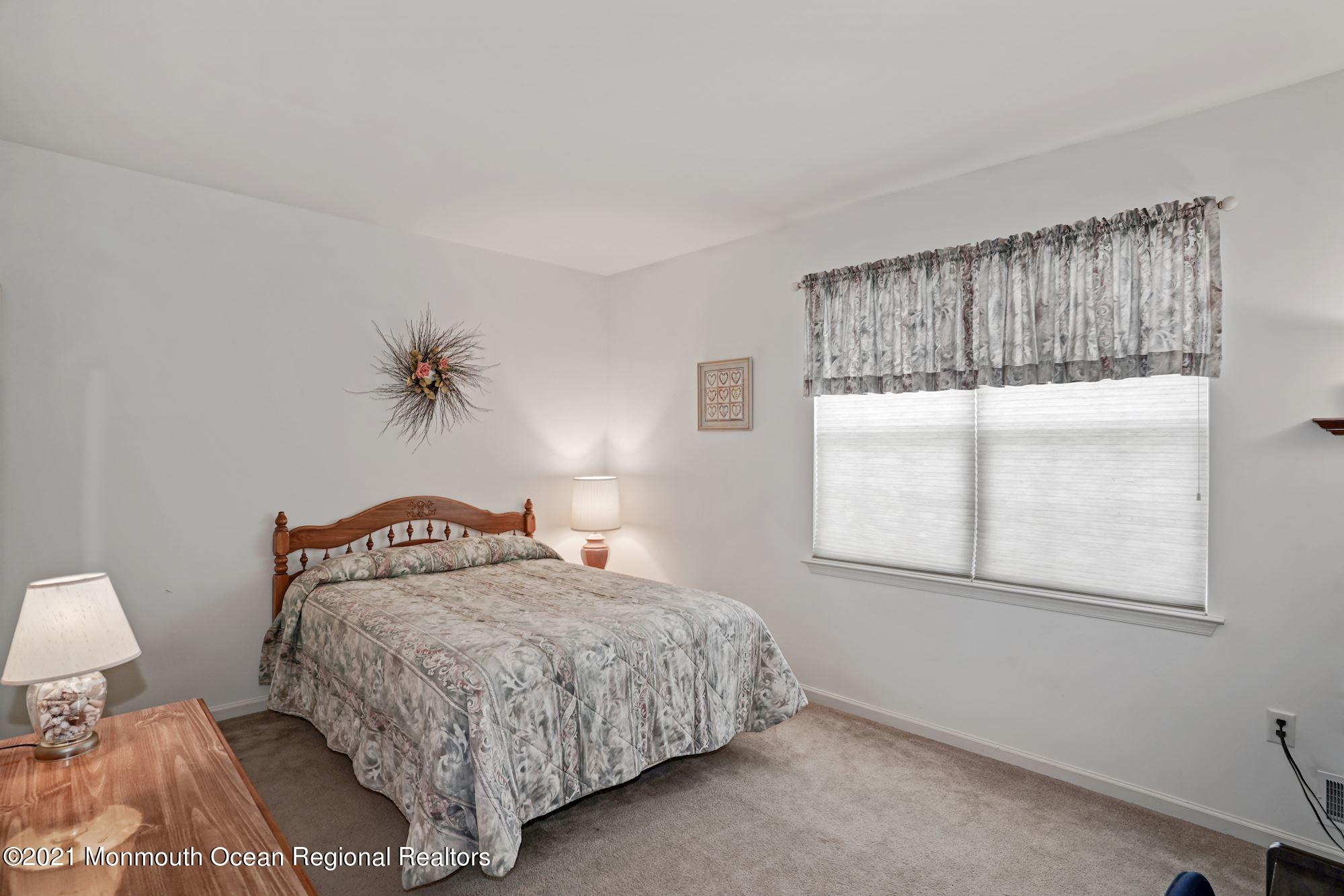 26 Shelley Road Brick, NJ 08724 - Photo 22 of 37 a bedroom with a bed and a window