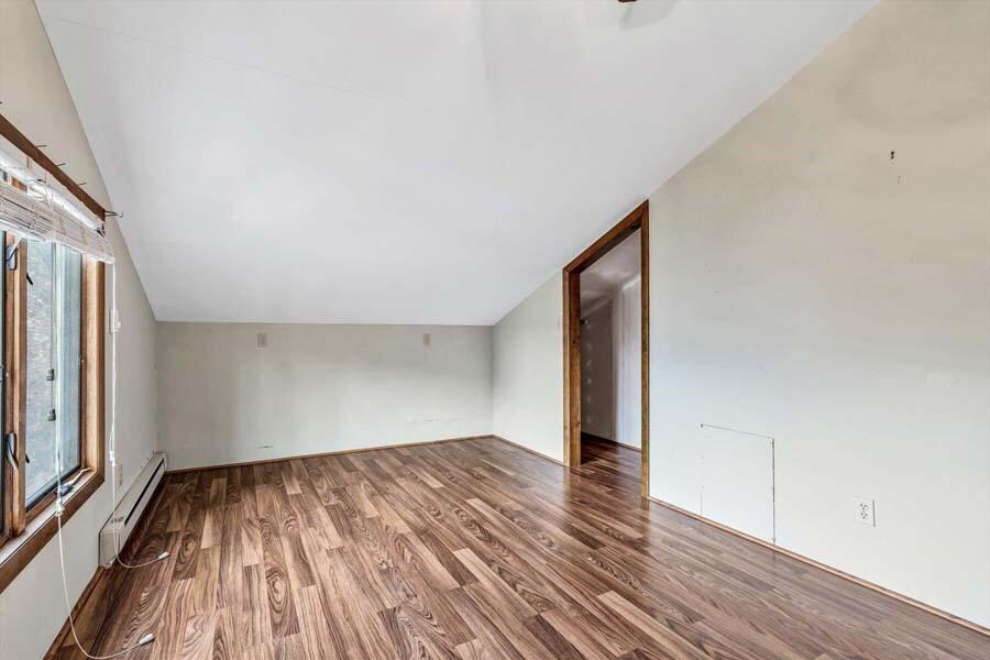 45 Manitoba Road Mashpee, MA 02649 - Photo 14 of 34 a view of empty room with wooden floor and fan