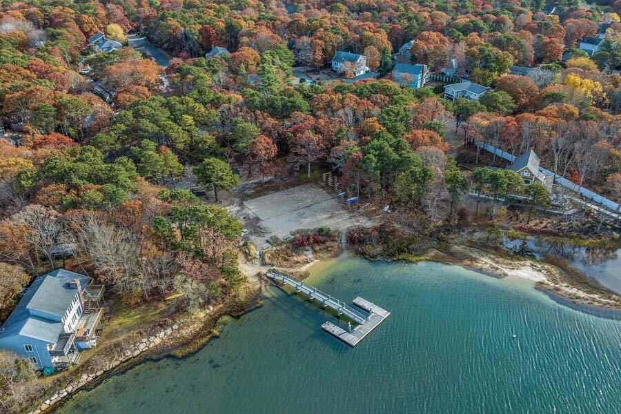 45 Manitoba Road Mashpee, MA 02649 - Photo 27 of 34 an aerial view of residential house with outdoor space and trees all around