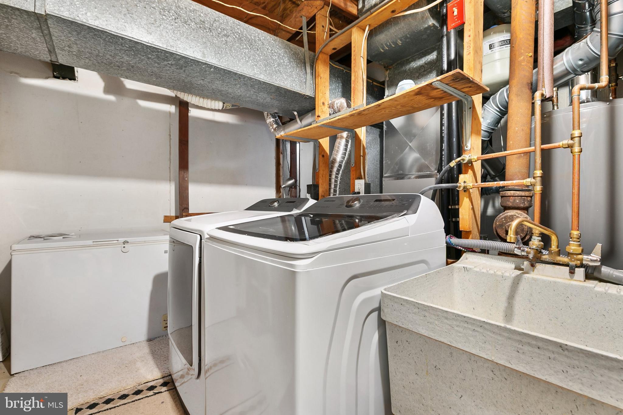 11501 Piney Lodge Road North Potomac, MD 20878 - Photo 44 of 64 a utility room with dryer and washer
