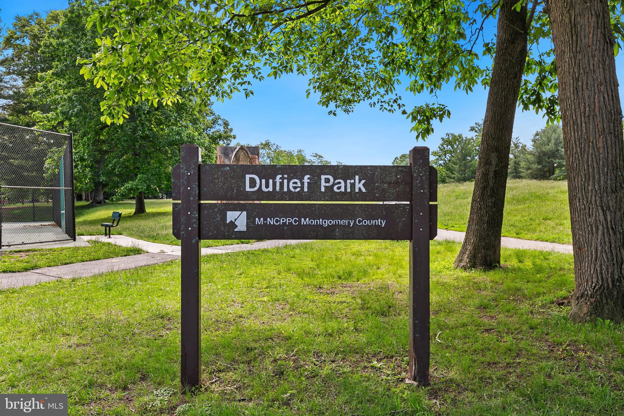 11501 Piney Lodge Road North Potomac, MD 20878 - Photo 50 of 64 a view of a park with welcome board