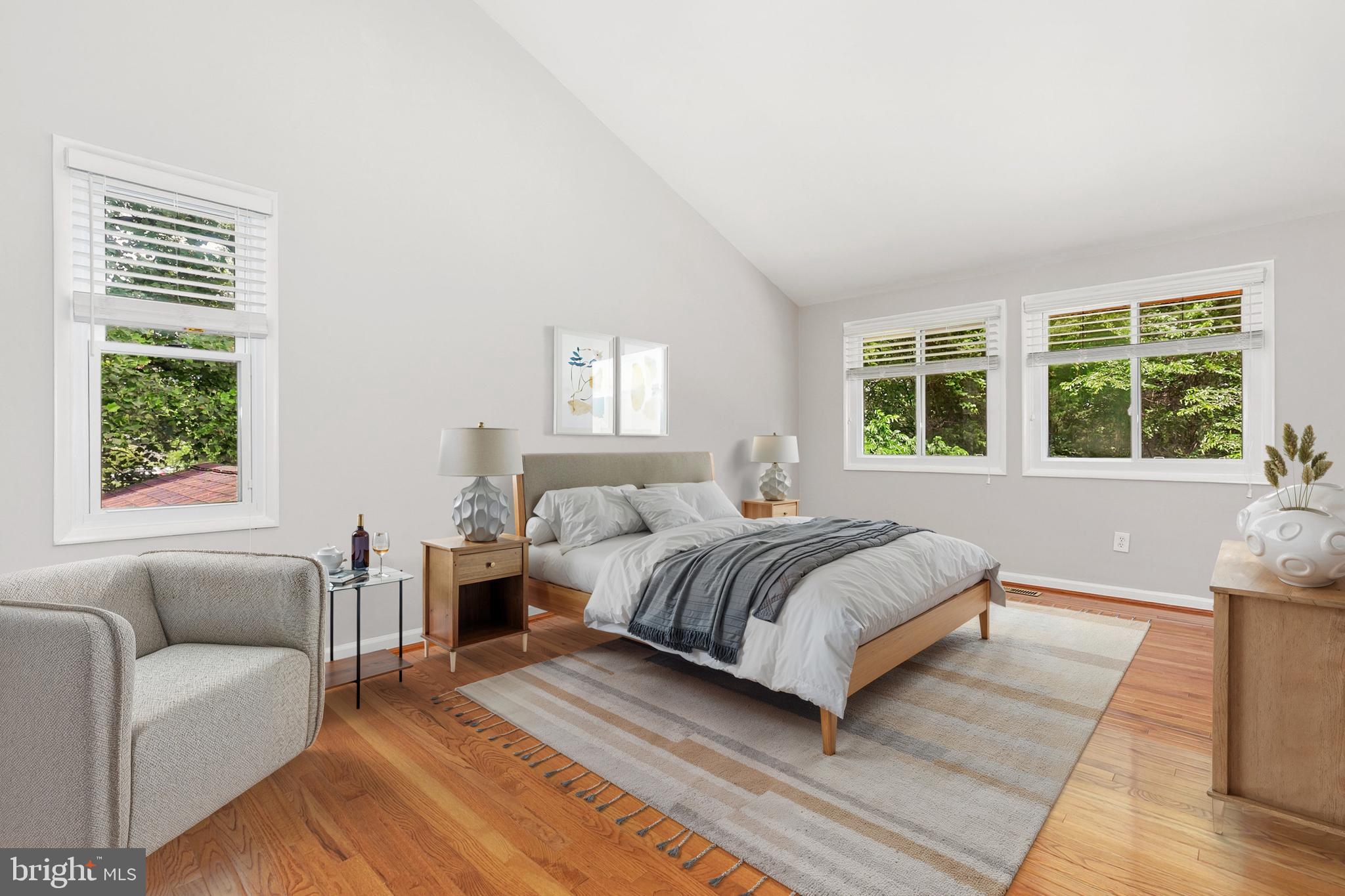 11501 Piney Lodge Road North Potomac, MD 20878 - Photo 60 of 64 a bedroom with a bed and a couch with window