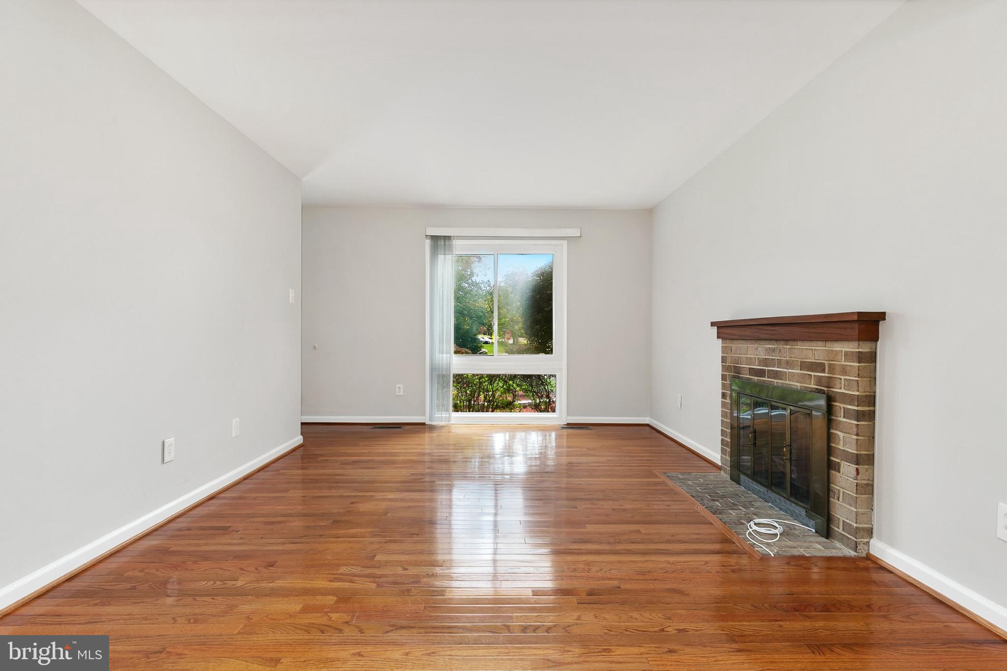 11501 Piney Lodge Road North Potomac, MD 20878 - Photo 6 of 64 a view of an empty room with glass door
