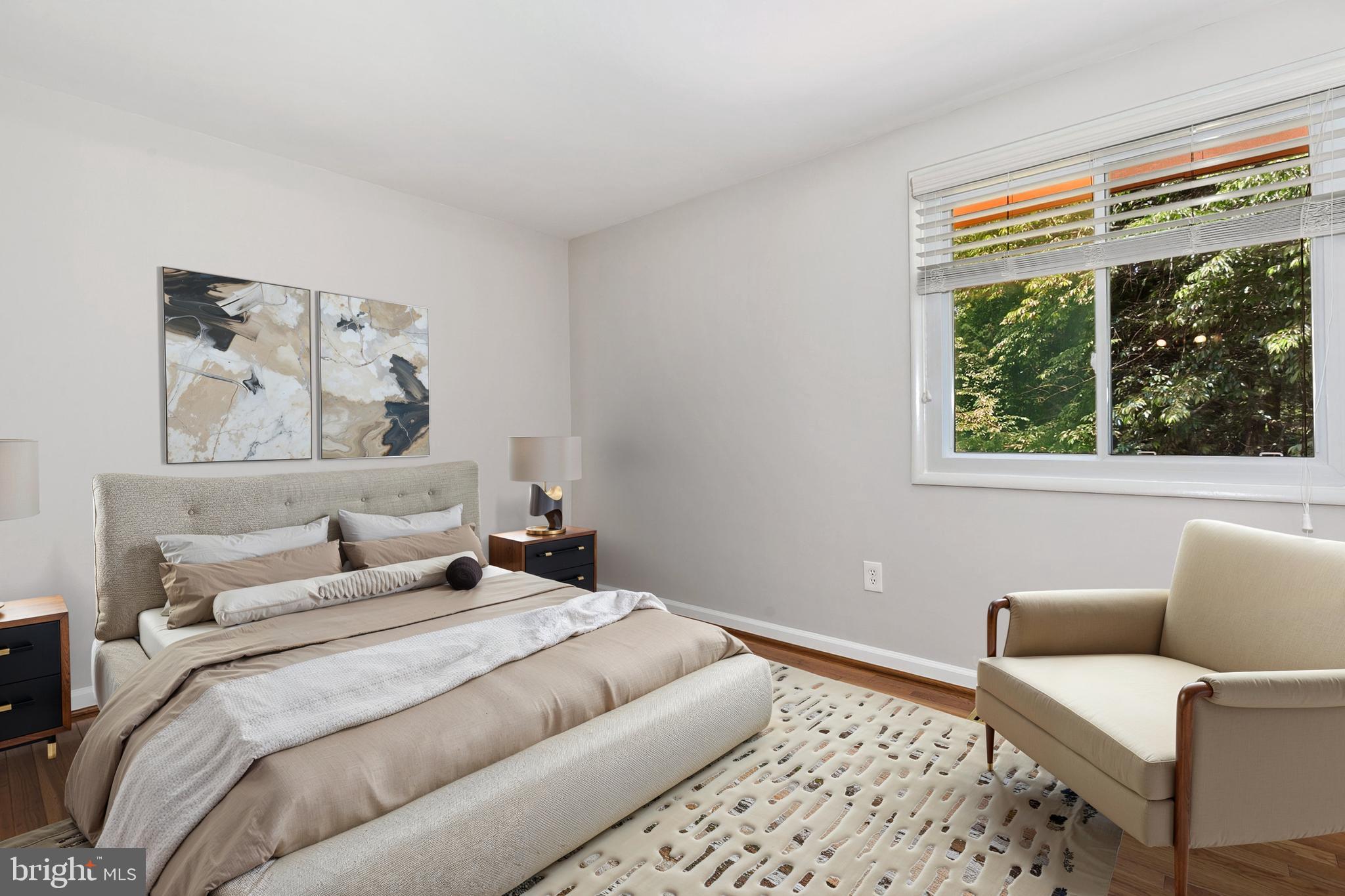 11501 Piney Lodge Road North Potomac, MD 20878 - Photo 61 of 64 a bedroom with a bed and a couch with window