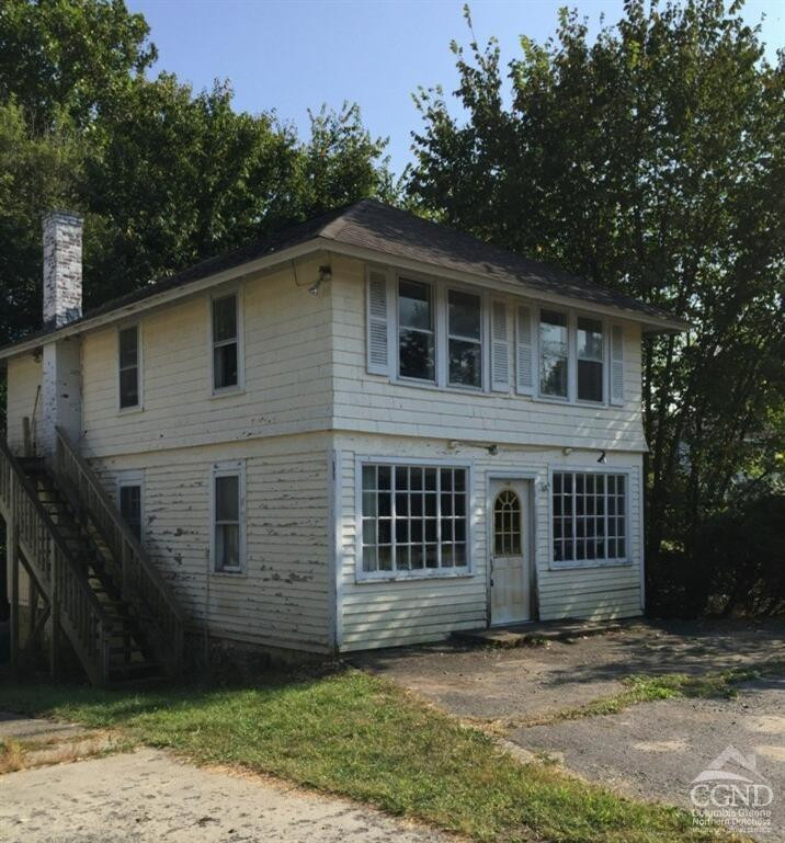 190 County Route Copake, NY 12516 - Photo 2 of 20 a front view of a house with a garden